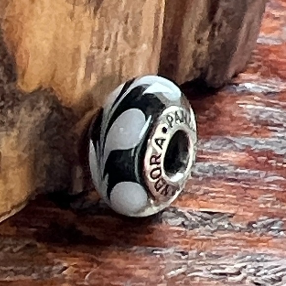 Pandora Retired Black and White Swirl
Murano Glass Charm - 790676 Sterling Core - Picture 4 of 6